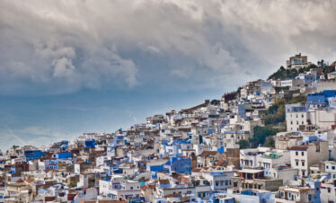 Blue-washed houses of Chefchaouen below the Rif mountains in northern Morocco
