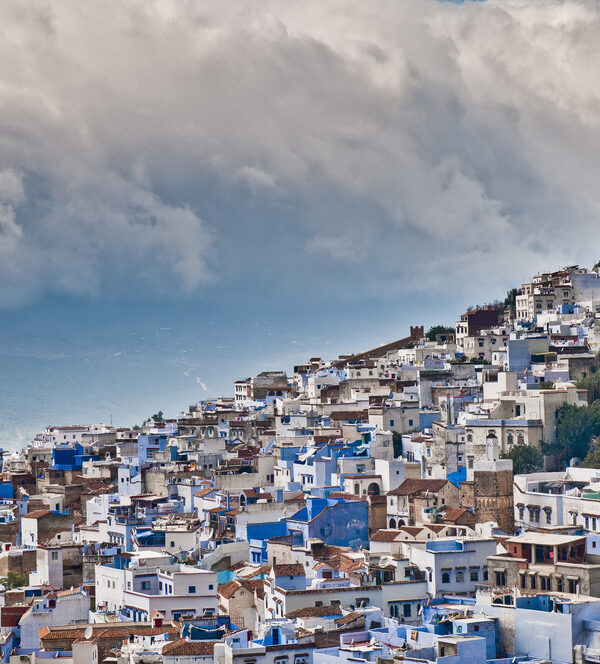 Blue-washed houses of Chefchaouen below the Rif mountains in northern Morocco