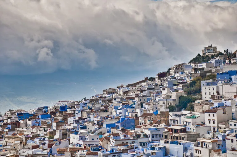 Blue-washed houses of Chefchaouen below the Rif mountains in northern Morocco