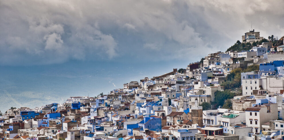 Blue-washed houses of Chefchaouen below the Rif mountains in northern Morocco
